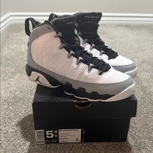Youth size 5.5 Air Jordan 9 Retro BG. Excellent condition only worn one time.